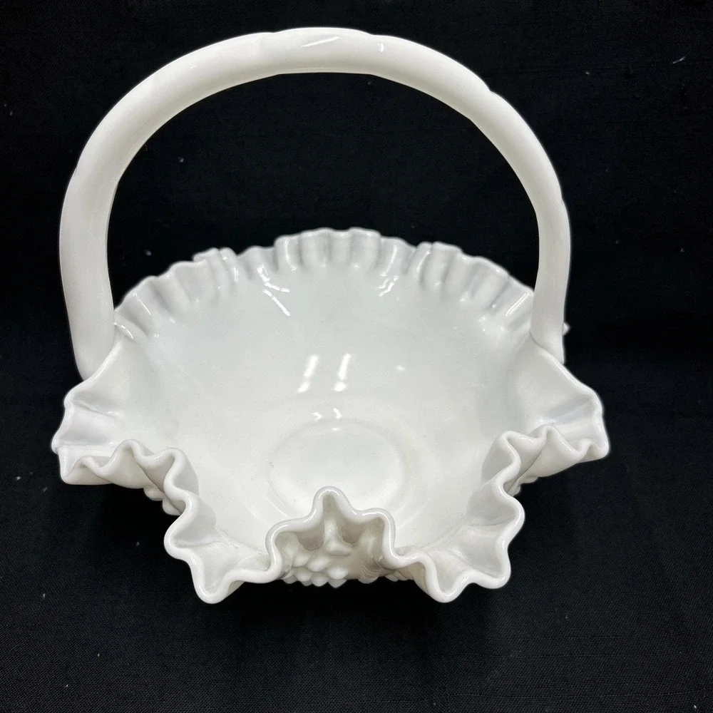 Vintage Fenton Hobnail White Milk Glass Basket with a ruffled edge and handle